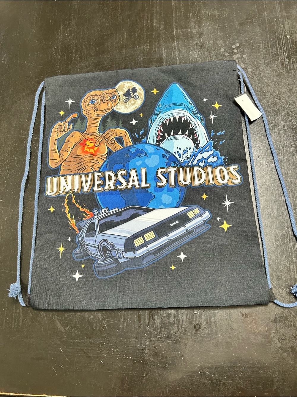 Universal Black Drawstring Backpack with Blue and Multicolor Movie Graphics